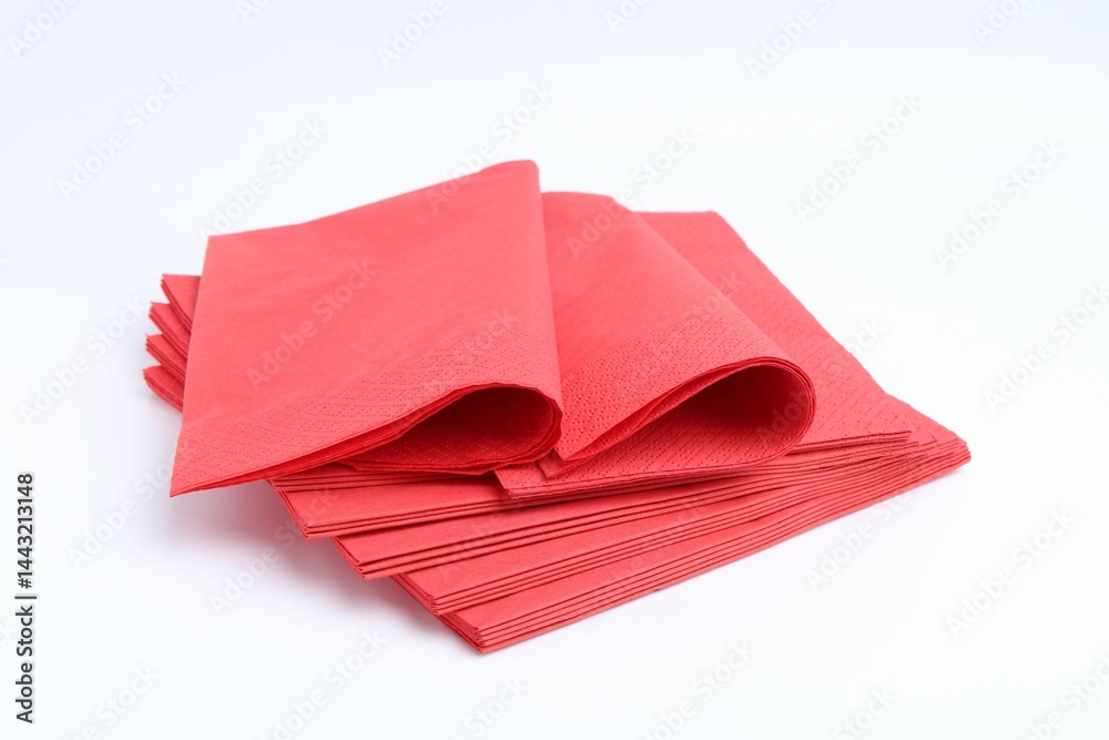 Many red paper handkerchiefs isolated on white Many red paper handkerchiefs isolated on white