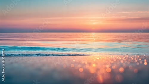 Serene sunset over tranquil ocean waves with soft reflections  