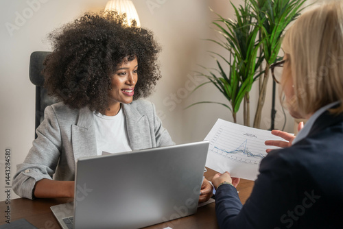 Legal consultancy concept. Business woman lawyer attorney showing document to man client providing advisory services, professionals discussing tax papers working in office at meeting
