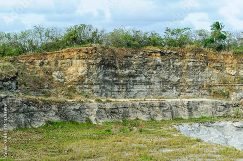 Abandoned Limestone Quarry with Rocky Cliffs and Vegetation in João Pessoa, Paraiba, Brazil on January 4, 2010.