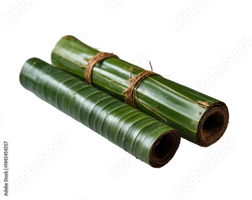 Intricate rolls of tropical coconut leaves, expertly prepared for use in artisanal craftwork, showcasing the versatility of natural island materials