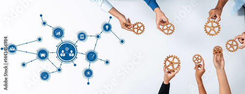 Visual representation of collaboration in business through hands holding gears, illustrating teamwork, strategy, and efficiency in modern organizational settings, fostering innovation. Amity