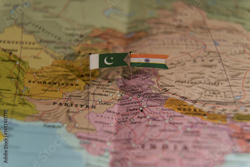 Pakistan and India flags on map showing political tension, conflict, and border disputes