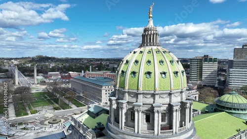 Harrisburg, Pennsylvania USA – 4 24 2024: Stunning 4K drone video capturing the Pennsylvania State Capitol building in Harrisburg from above.  photo