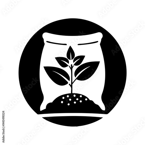 Black and White Image of Seedling Emerging from Bag of Soil