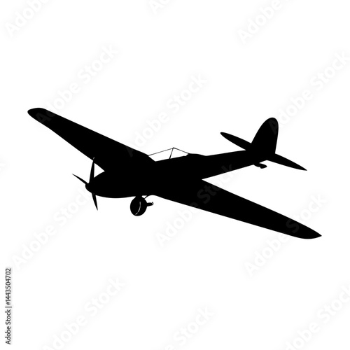 A dramatic silhouette of a classic World War II fighter plane