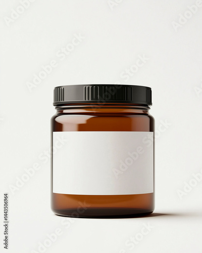 Amber glass jar with a blank white label and black lid, isolated on a beige background.