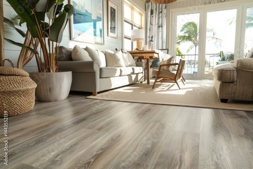 Stylish beach-themed living area with light-filled open space and beautifully designed SPC flooring