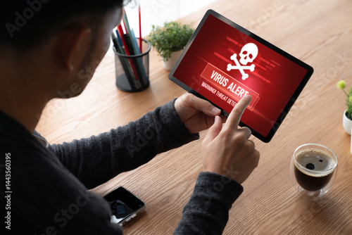 Virus warning alert on computer screen detected modish cyber threat , hacker, computer virus and malware