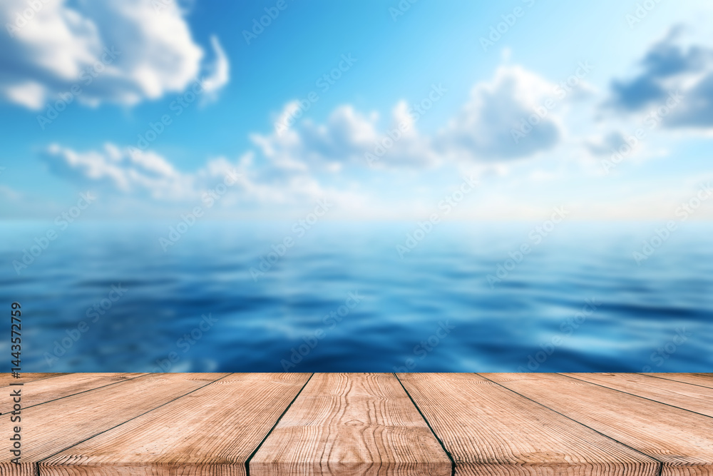 Empty wood table top and blurred summer beach with blue sea and sky banner background. - can used for display or montage your products. Empty wood table top and blurred summer beach with blue sea and sky banner background. - can used for display or montage your products.