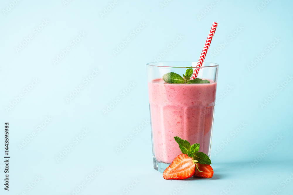 Strawberry smoothie or milkshake on white.
