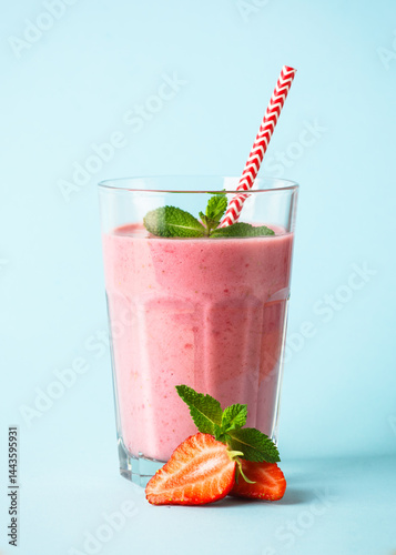 Strawberry smoothie or milkshake on white.