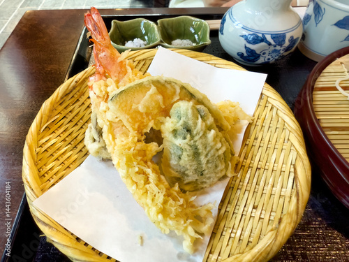Top view of batter fried shrimp and vegetable commonly called Japanese tempura in bamboo dish