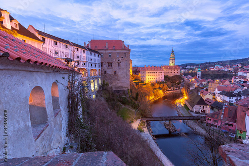 Obraz na płótnie Cityscape and tower illuminated at sunset in Cesky Krumlov, Czech Republic w salonie
