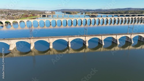Amazing 4k drone video. Footage at low angle of a bridge on the Susquehanna river.  Smooth fluid video with beautiful reflection on the blue waters