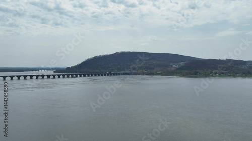 Shocks Mills Bridge on the Susquehanna River in Harrisburg Pennsylvania. Beautiful drone photograph of open Pennsylvania landscape.  Open skies and clear views of sounding mountains and flowing river