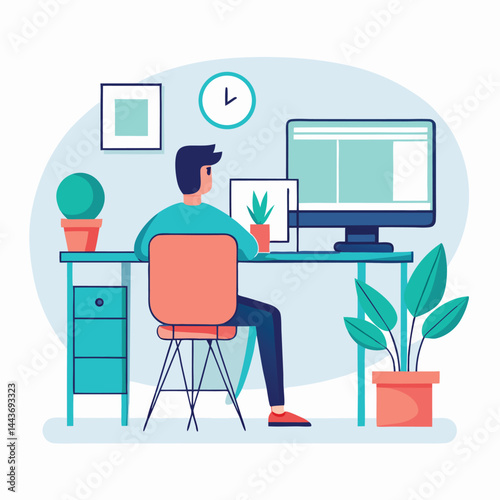 Back view of a darkhaired male sitting at his desk with a computer screen