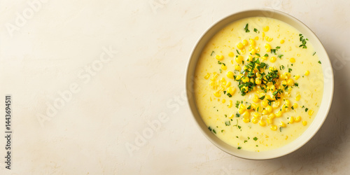 Obraz na płótnie Right-side Comfort: Creamy corn chowder bowl perched right, beige canvas left for text w salonie