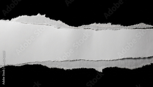 ripped torn paper edges isolated on black background