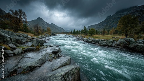 Mountain River Rapids Under Stormy Skies