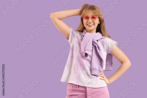 Pretty young woman in sungl...