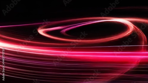 Dynamic light trails swirl and intertwine, creating captivating patterns against a dark backdrop, showcasing artistic creativity and movement during a nighttime event