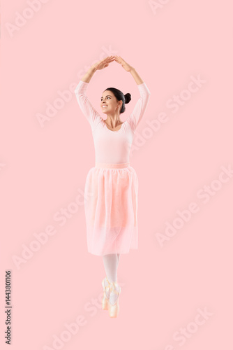 Young female ballerina jump...