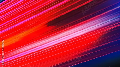 Experience a captivating blend of colors and movement as dynamic lines flow seamlessly across a dark background, evoking a sense of energy and creativity during twilight