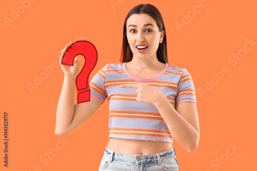 Young woman pointing at pap...