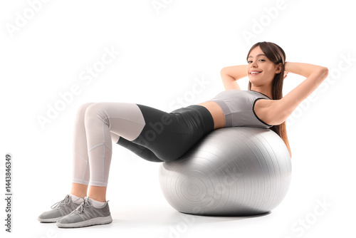 Sporty young woman doing ae...