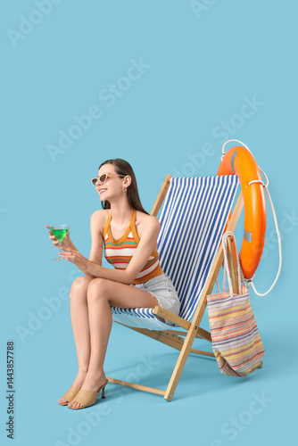 Happy young woman in deck c...
