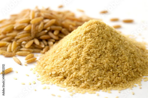 Golden Rice Bran and Whole Rice Grains on White Background