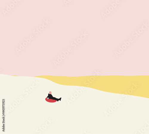 Man sitting on tubing on snowy downhill during Winter holiday and vacation. Enjoying, relaxing outdoor.
