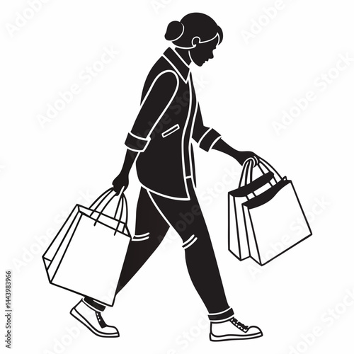Silhouette Of Woman Walking Carrying Shopping Bags After Retail Therapy