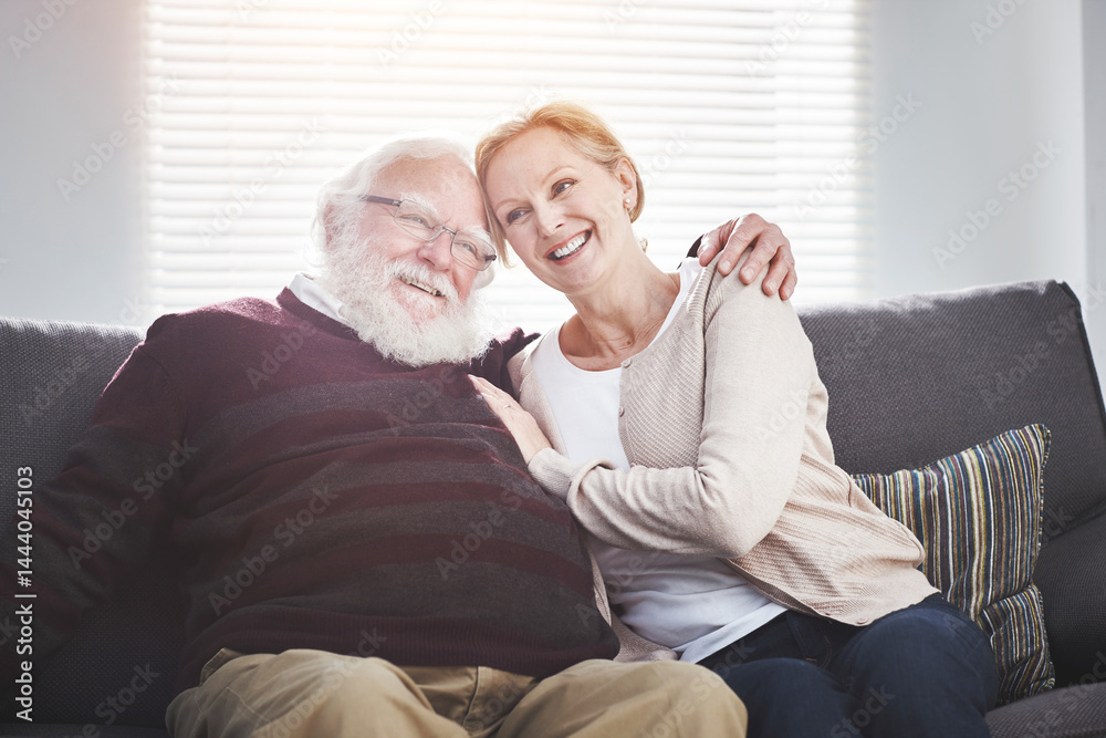 Happy, carefree and loving senior couple hugging and relaxing on a couch at home enjoying retirement together. Excited, joyful and retired mature lovers bonding on a sofa having a fun weekend Happy, carefree and loving senior couple hugging and relaxing on a couch at home enjoying retirement together. Excited, joyful and retired mature lovers bonding on a sofa having a fun weekend