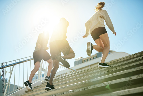 Canvastavla Fitness, group and running in city for exercise, body wellness or friends training with coach in low angle