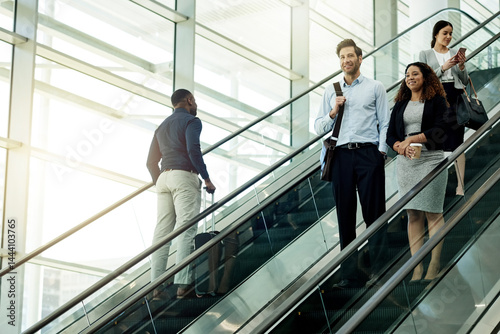 Obraz na płótnie Business people, escalator and start of work in office, travel and group of employees for arrival. Colleagues, company convention and modern transportation to seminar, commute together and leaving w salonie