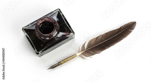 Quill pen and inkwell on white background creating a classic writing scene for authors and history enthusiasts providing a vintage aesthetic
