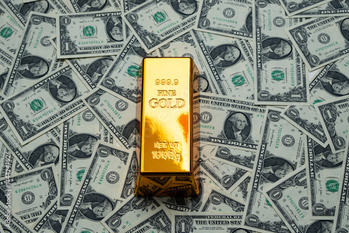 Obraz na płótnie Money dollars gold bar. Saving finance in gold bar. Dollars vs gold bar. Saving money background. Dollar bills vs gold bars. Banknotes and goldbar. Banking and savings. Golden money. Precious metals. w salonie