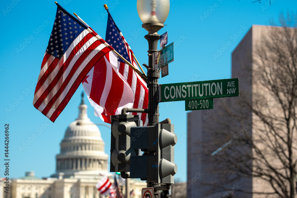 Capitol as a symbol of democracy in Washington, DC. The Capitol building on Capitol Hill. US government. American flag adorns the dome of the historic Capitol. The Senate. Capital of America.