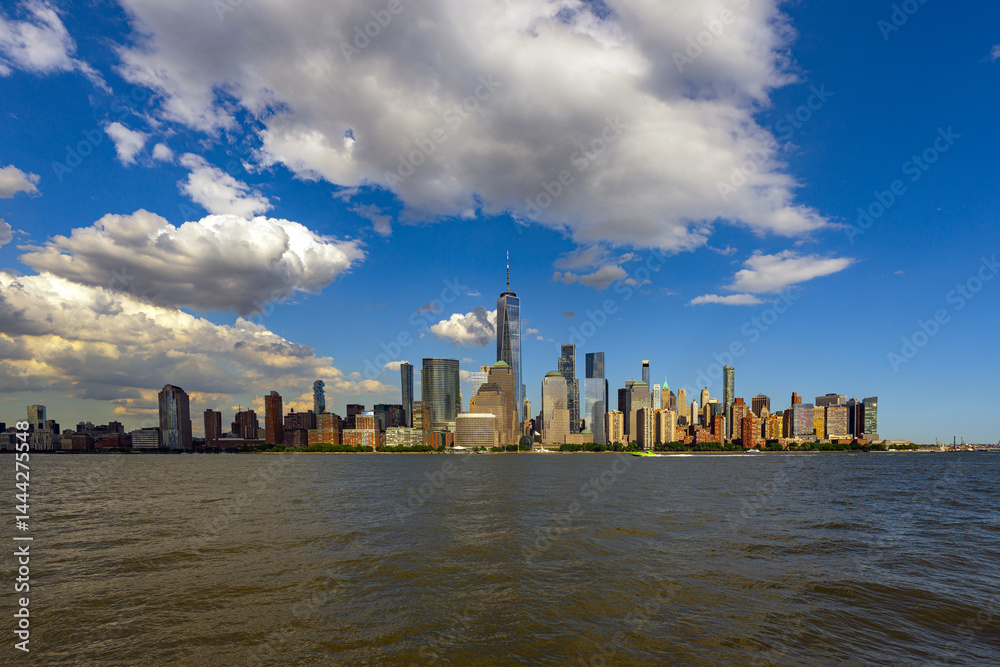 New York city. NYC cityscape. Manhattan and WTC in New York Cit. Skyscrapers of Manhattan near rippling water of New York bay. New York skyscrapers. Brooklyn district. NY city.