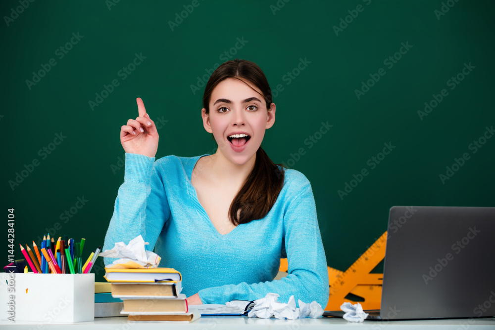 Student in high school classroom. Knowledge in high school. High school or university concept. Young College student study near blackboard. Education concept. Lesson and homework in high school.