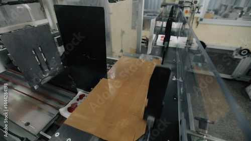 Conveyor line at paper mill. Modern production of napkins