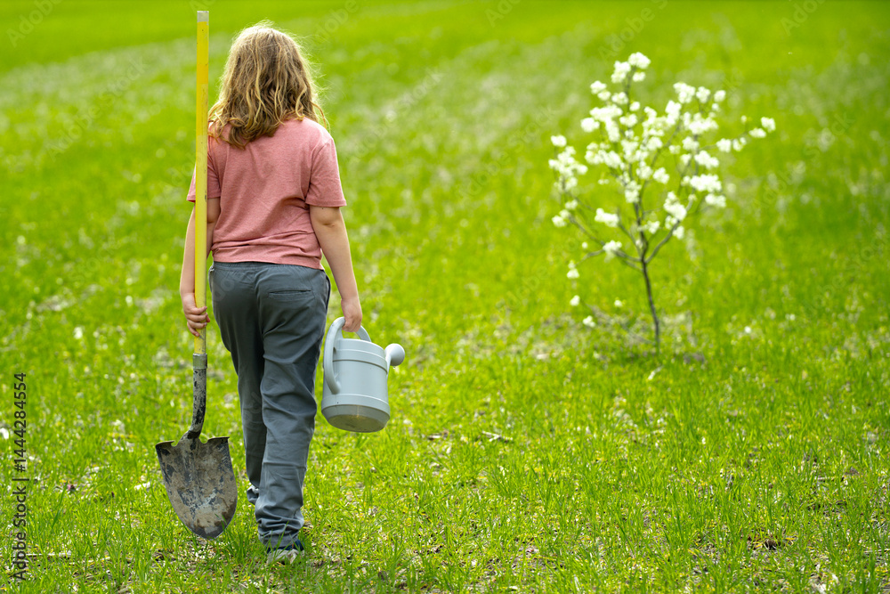 Child planting a spring tree. Kids grow up fruit tree. Kid gardener with shovel. Child work in orchard with blooming trees. Children planting trees in backyard. Young farmer caring for trees.