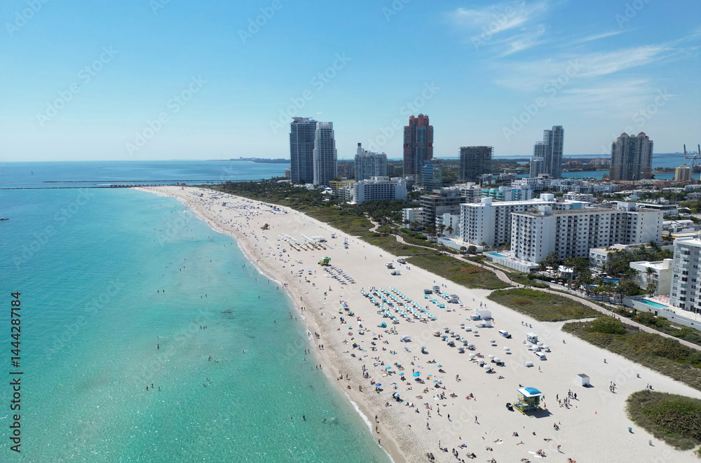 Miami Beach aerial view with skyline. Miami from above. Drone view of Miamis famous waterfront. South Pointe beach with skyscrapers. Miami city panorama. Oceanfront skyline of Miami Beach.