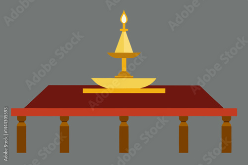 Illuminated Tabletop Golden Diya on a Rich Mahogany Table