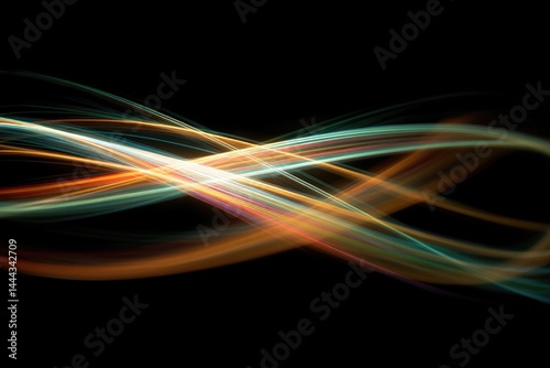 capture abstract arrangement of light trails in motion against dark background emphasizing dynamic dance of vibrant