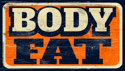 Aged vintage body fat sign on wood