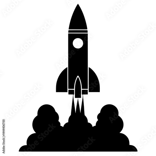 Silhouette of a rocket launching with smoke clouds and exhaust on a launch pad
