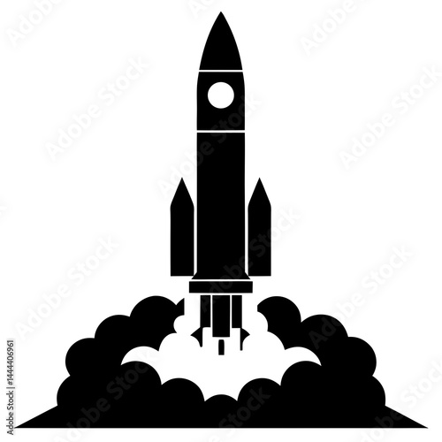 Silhouette of a rocket launching with smoke clouds and exhaust on a launch pad